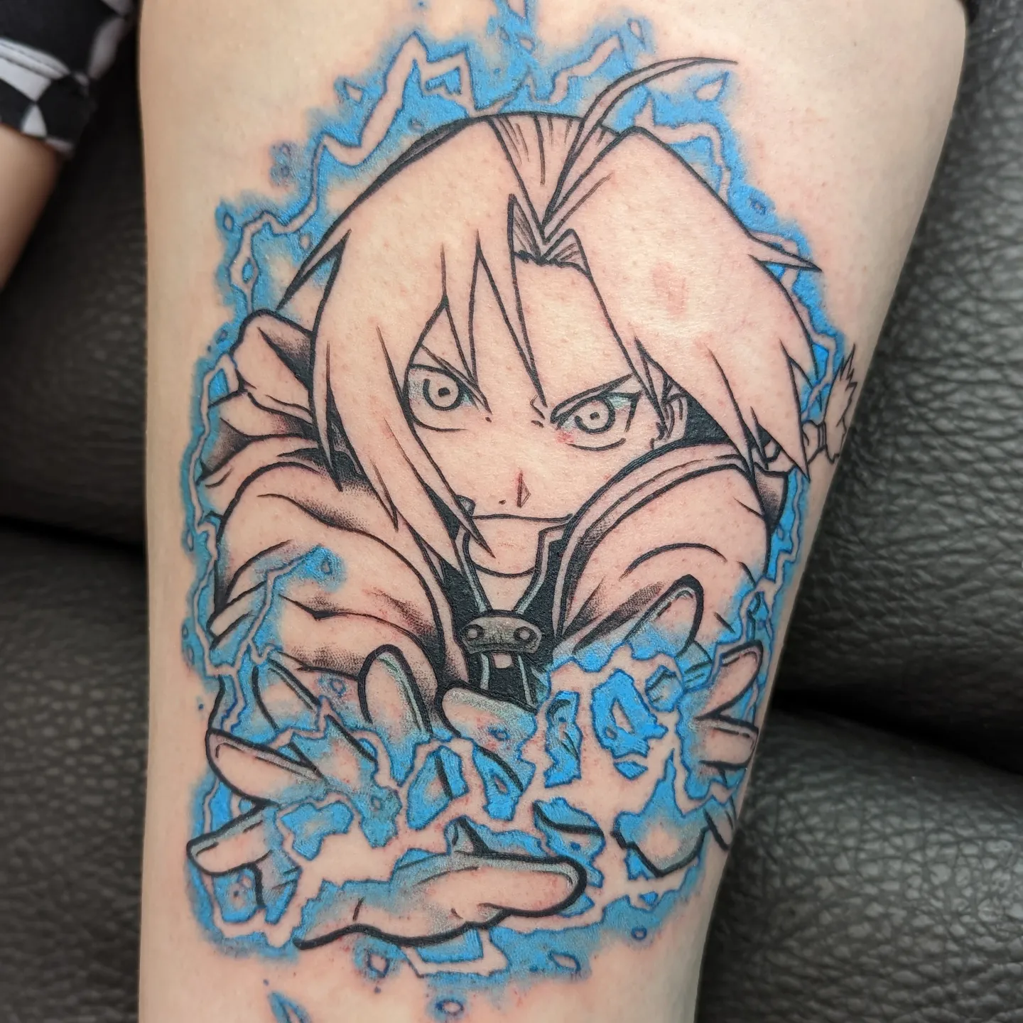 Anime character anime tattoo on the forearm by Harley Fulghum