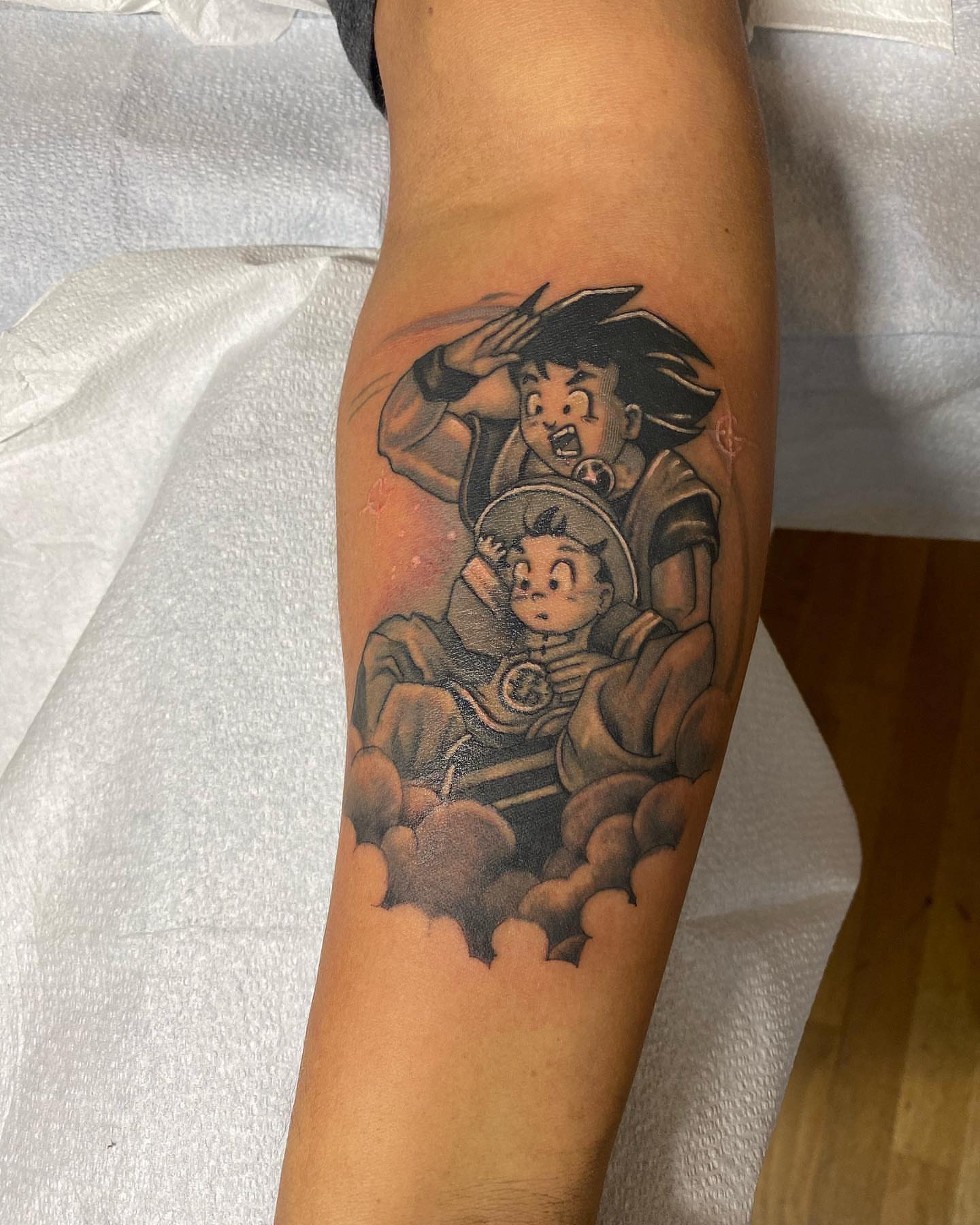 Goku and Trunks anime tattoo on the forearm by Shamanic Ink