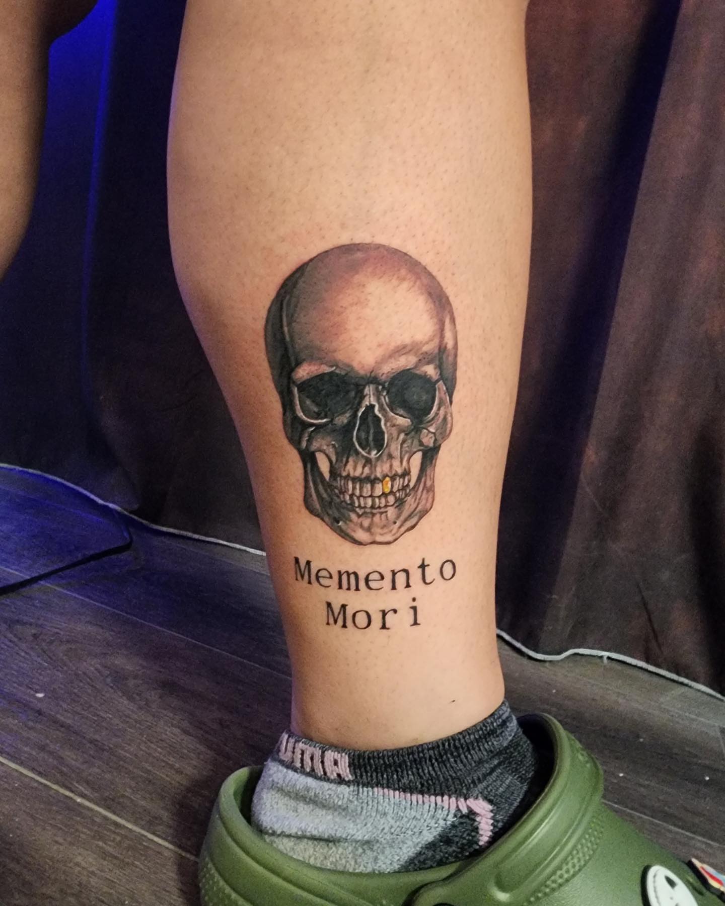 Skull realism tattoo on the calf by Devin Mullen