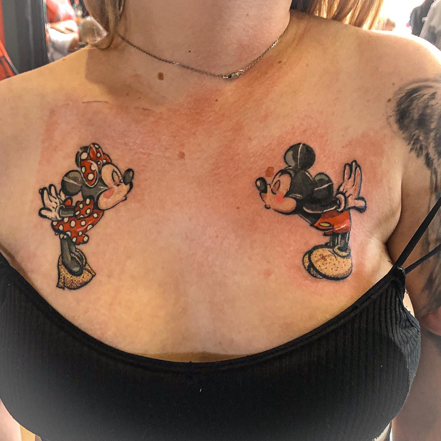 Minnie mouse and mickey mouse American traditional tattoo on the chest by NYC