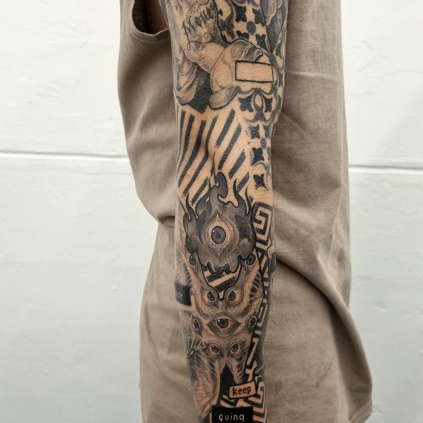 Eye and geometric patterns geometric tattoo on the forearm by Tattooer Hermin 허민