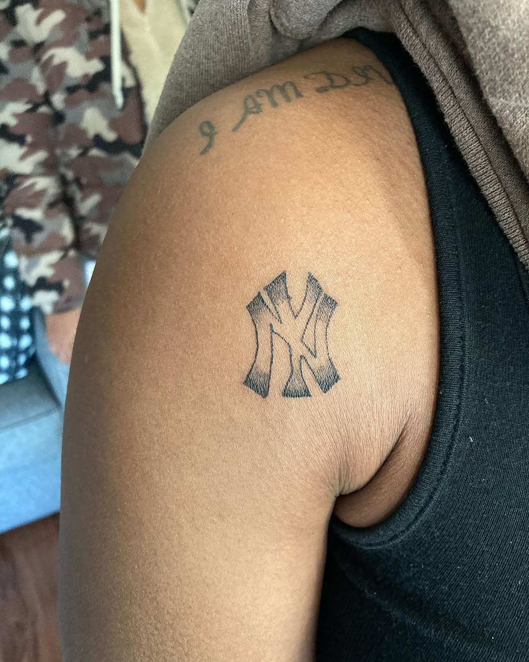 NY Yankees logo tattoo on the shoulder by CmoreInk