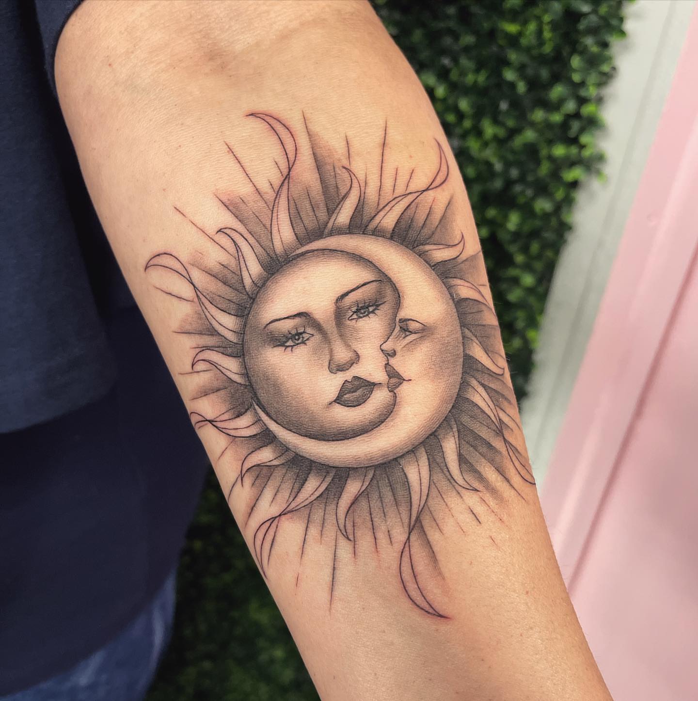 Sun and moon faces realism tattoo on the forearm by π‘πΆπΈπ½ππ ππΎππππ
