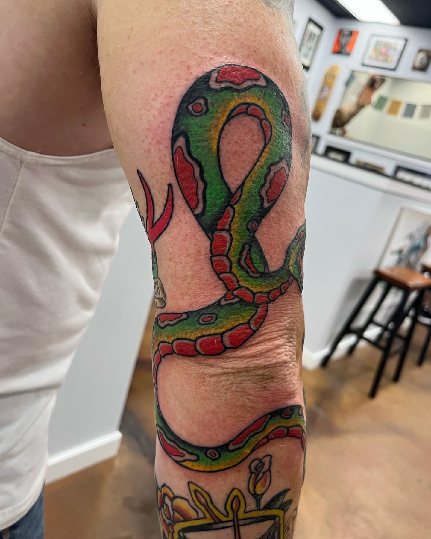 Snake American traditional tattoo on the forearm by Allie Tippets, Gilbert, Arizona