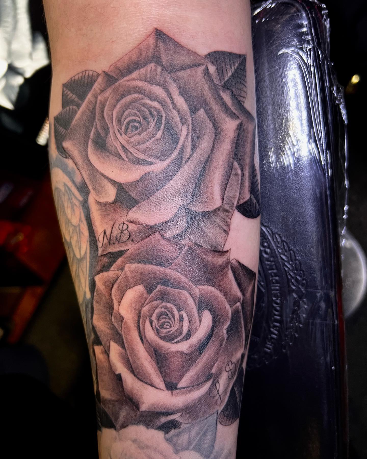 Roses realism tattoo on the forearm by JT Ink
