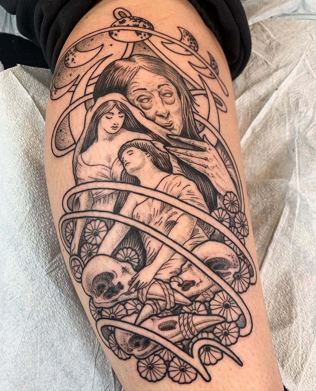 Three figures and skulls realism tattoo on the thigh by dayton skuse, Portland, Oregon