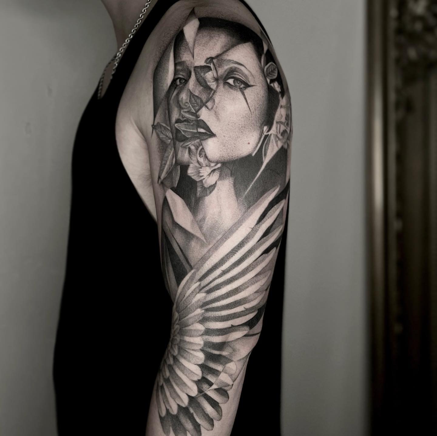 Woman's face realism tattoo on the forearm by Paige Jean