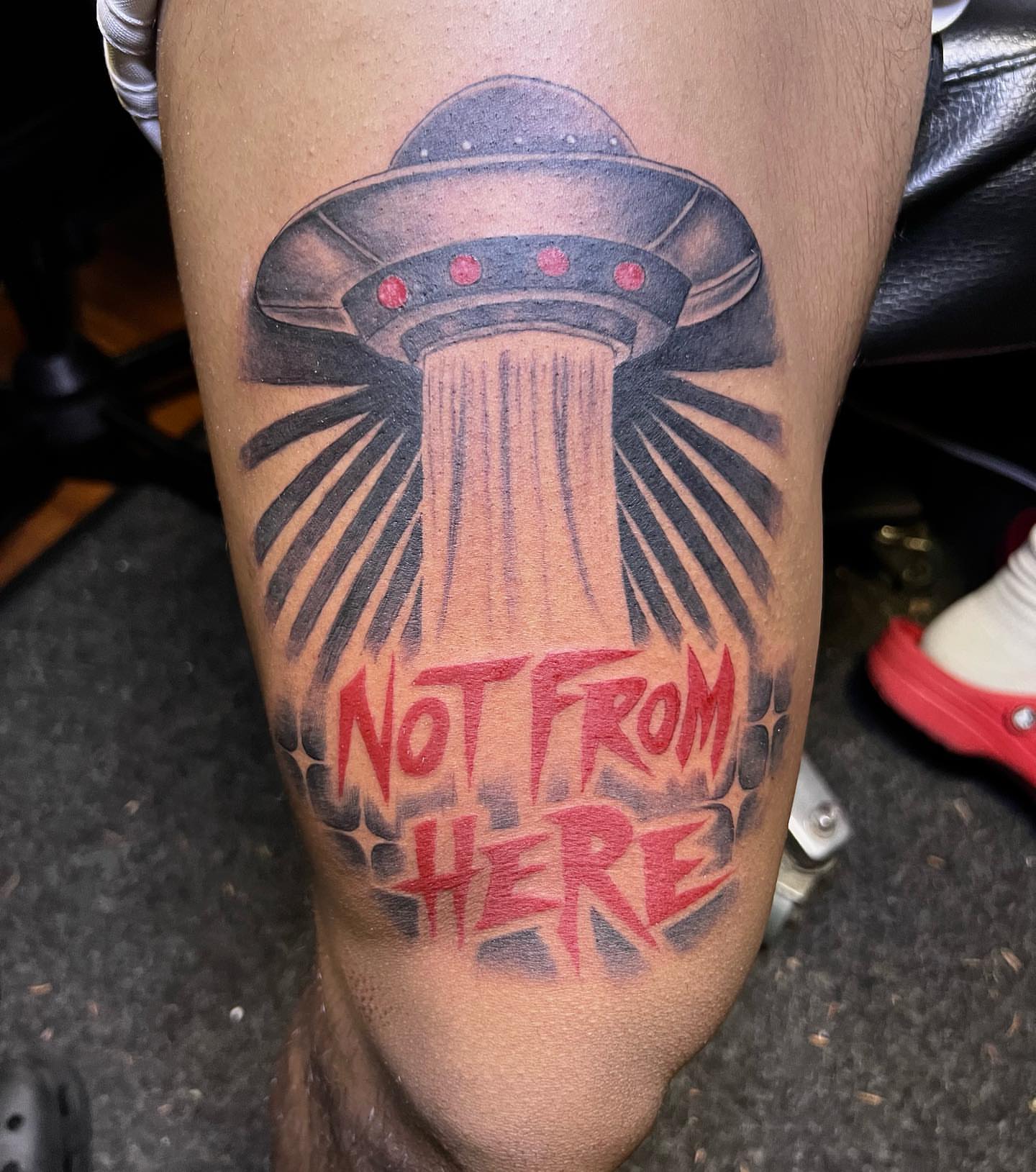 UFO abduction realism tattoo on the leg by JT Ink