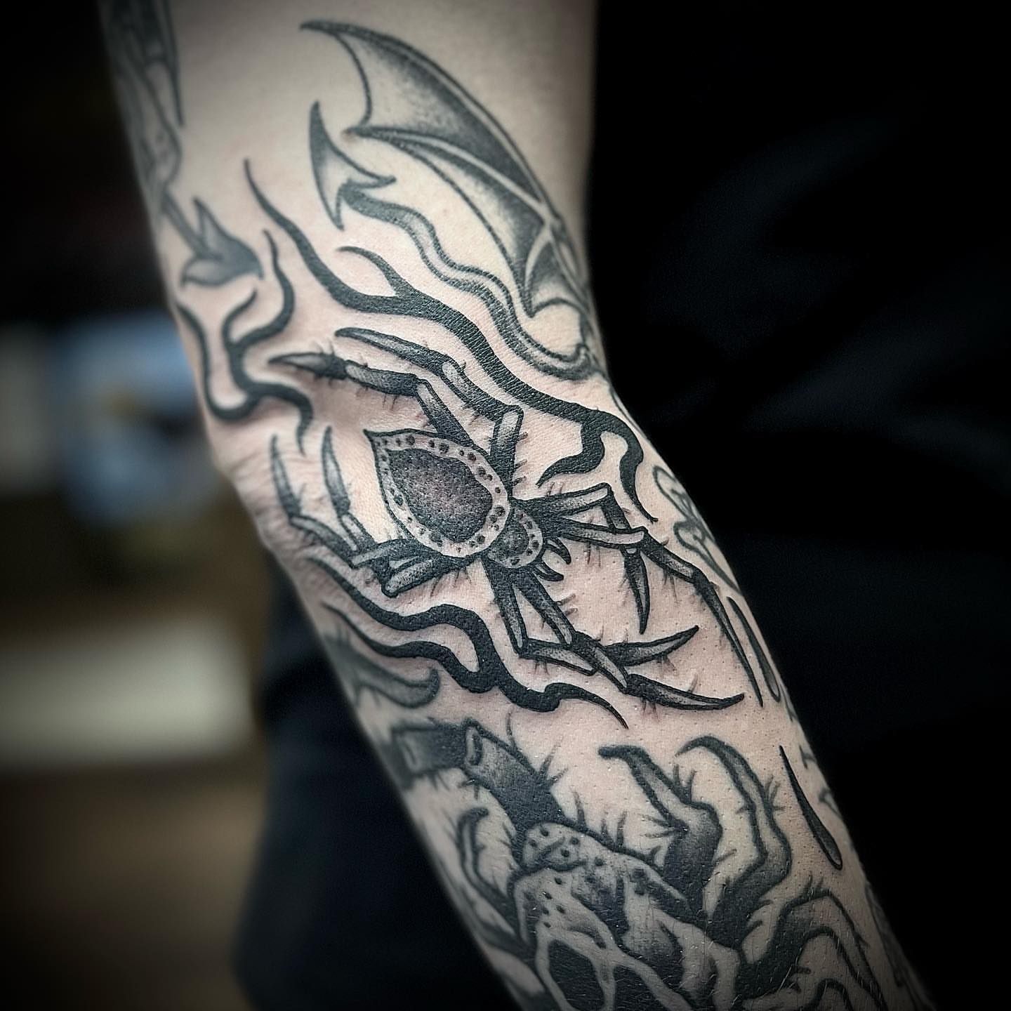 Spider black and grey tattoo on the forearm by Troy Mort, Altoona, Pennsylvania