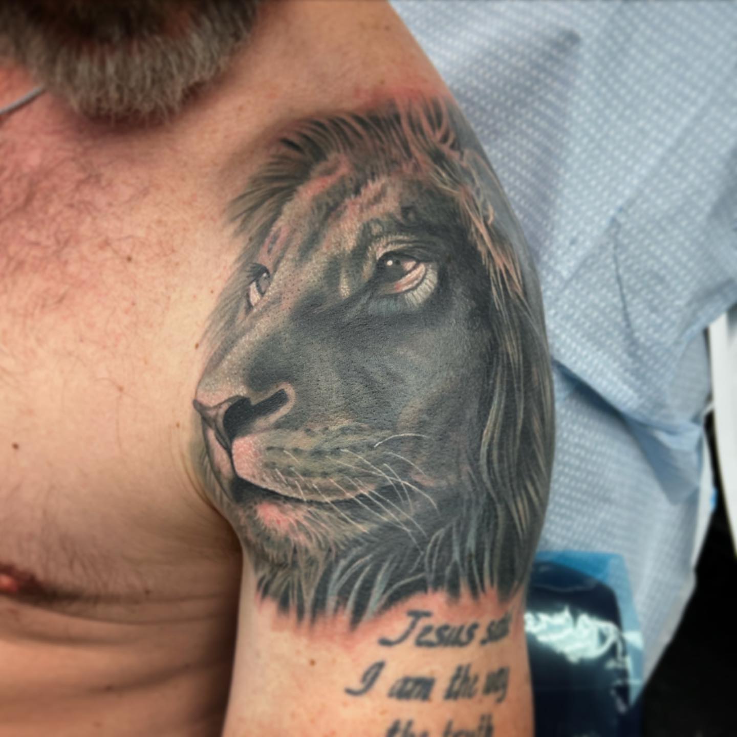 Lion realism tattoo on the shoulder by Mary Blake Tattoos, Franklin, Tennessee
