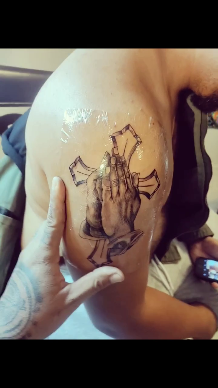 Praying hands with cross realism tattoo by Noriega Josué