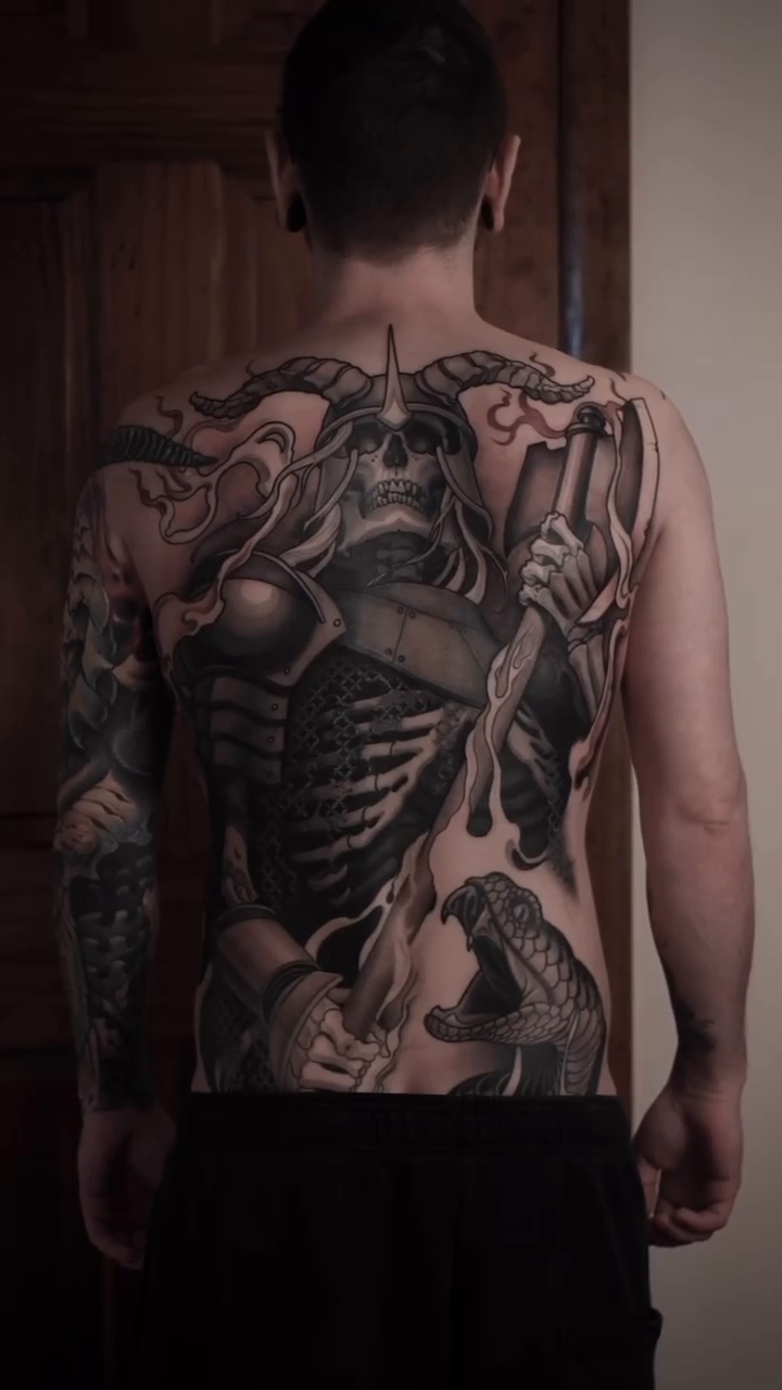 Tattoo by @michaeljtattoos — dark_realism, black_and_grey
