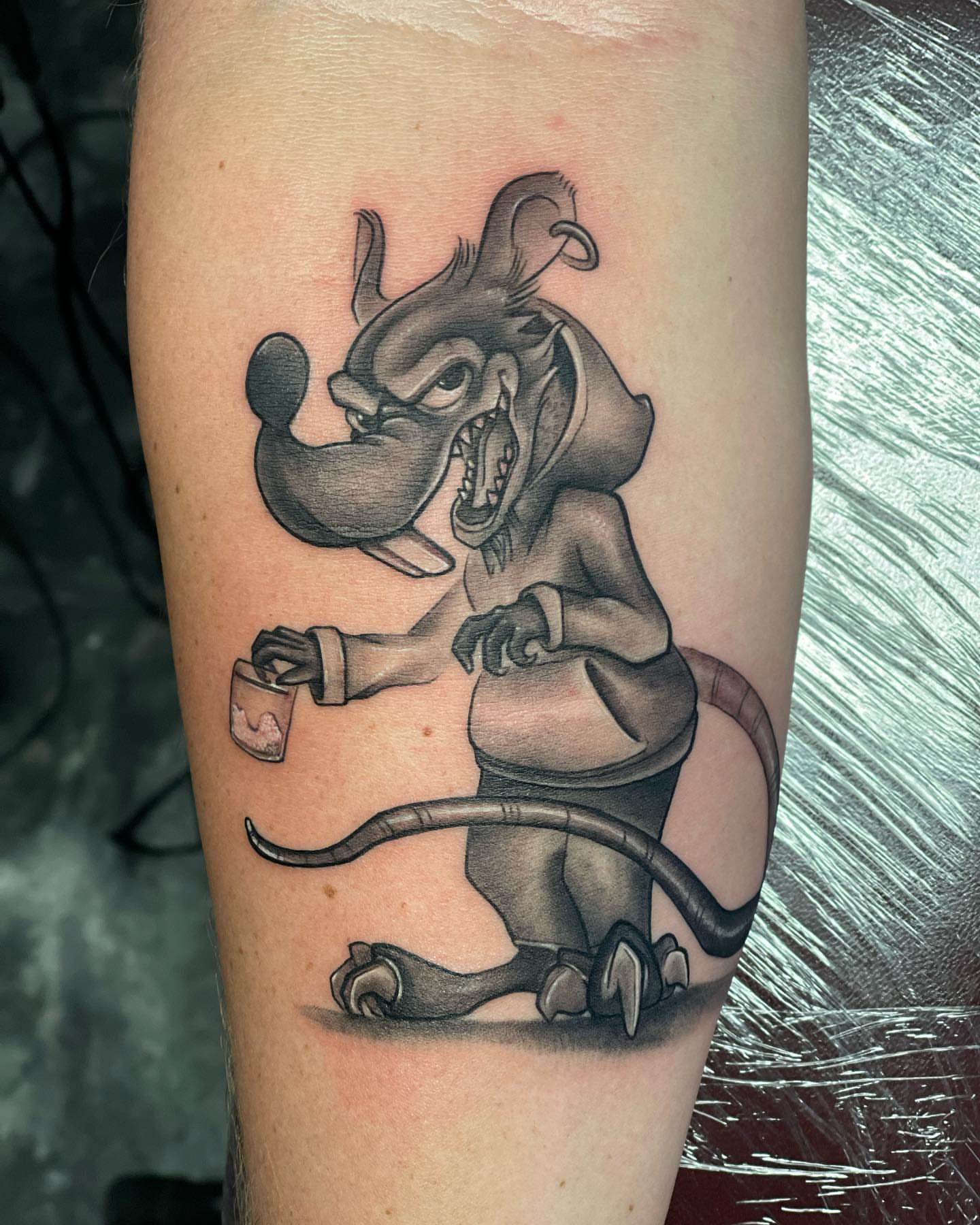 Angry dog black and grey tattoo on the forearm by Cuzmatt