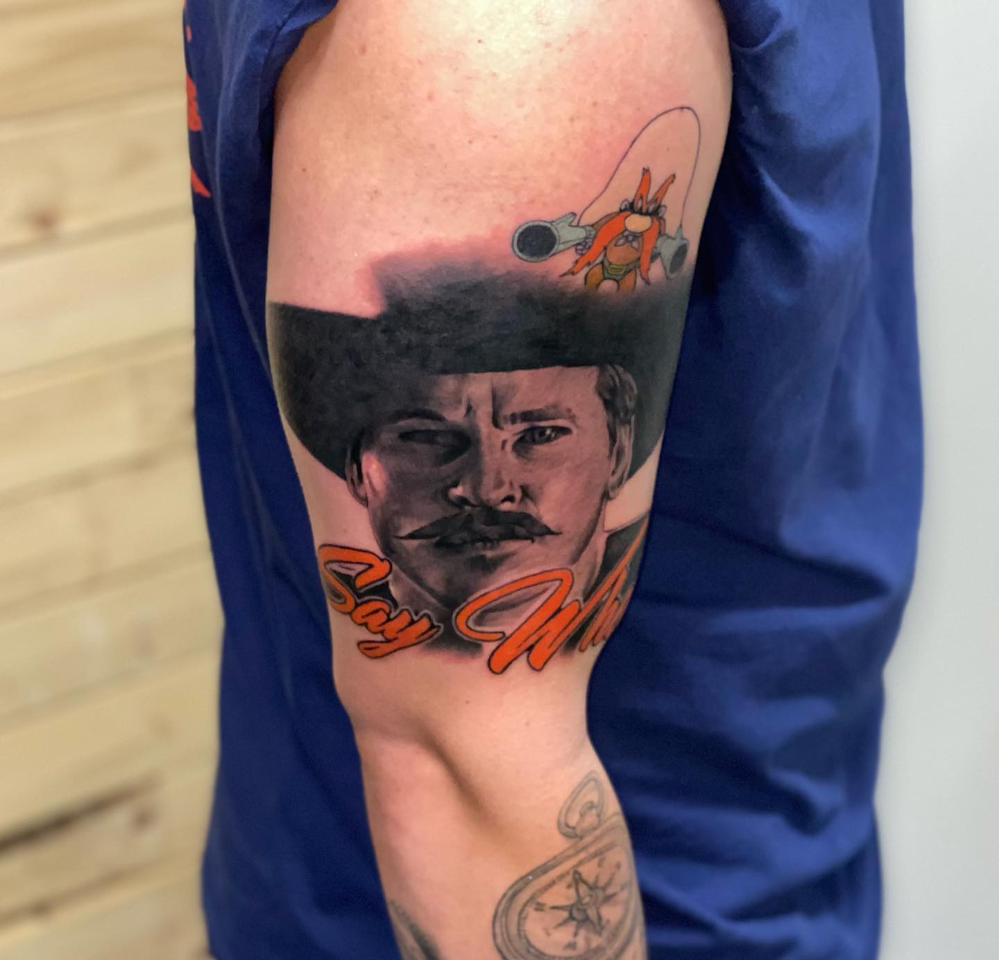 Cowboy portrait realism tattoo on the forearm by Zach Ashton