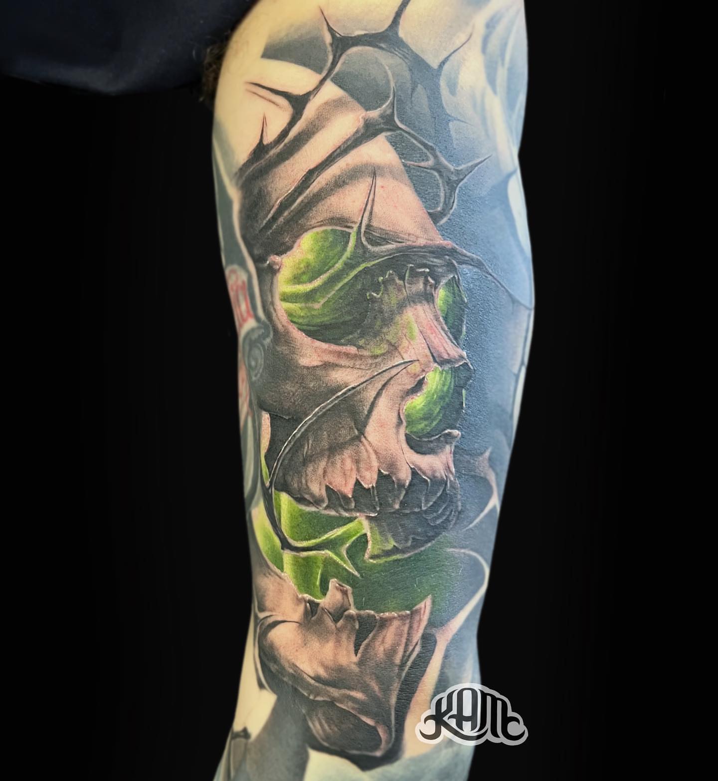 Skull dark realism tattoo on the forearm by Keith (KAM) Miller