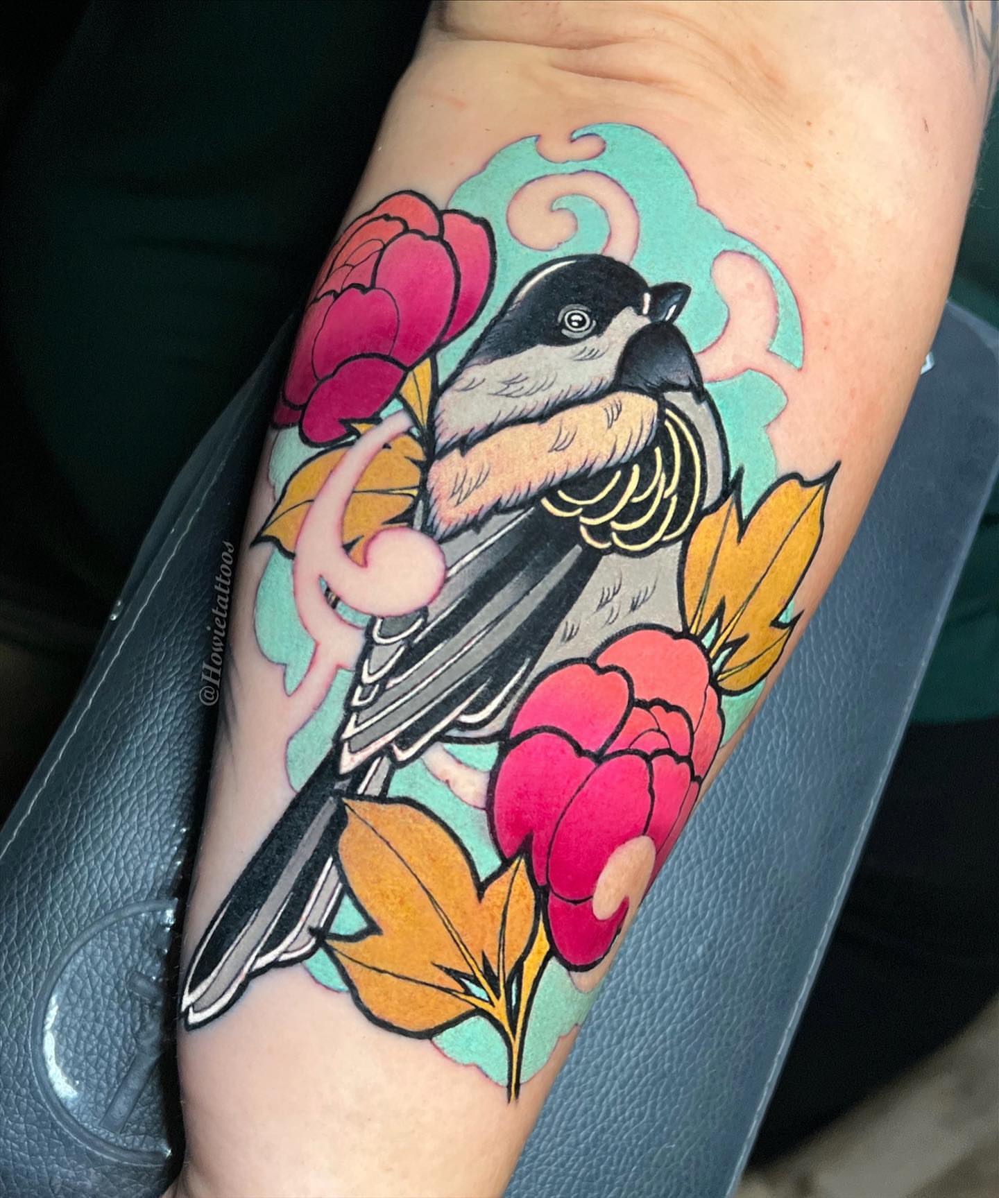Bird and flowers American traditional tattoo on the forearm by Brian Horowitz