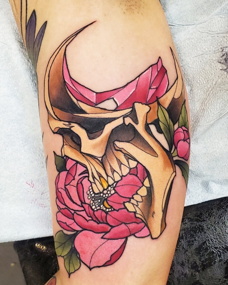 Skull with roses American traditional tattoo on the forearm by Brian Savage, Gilbert, Arizona