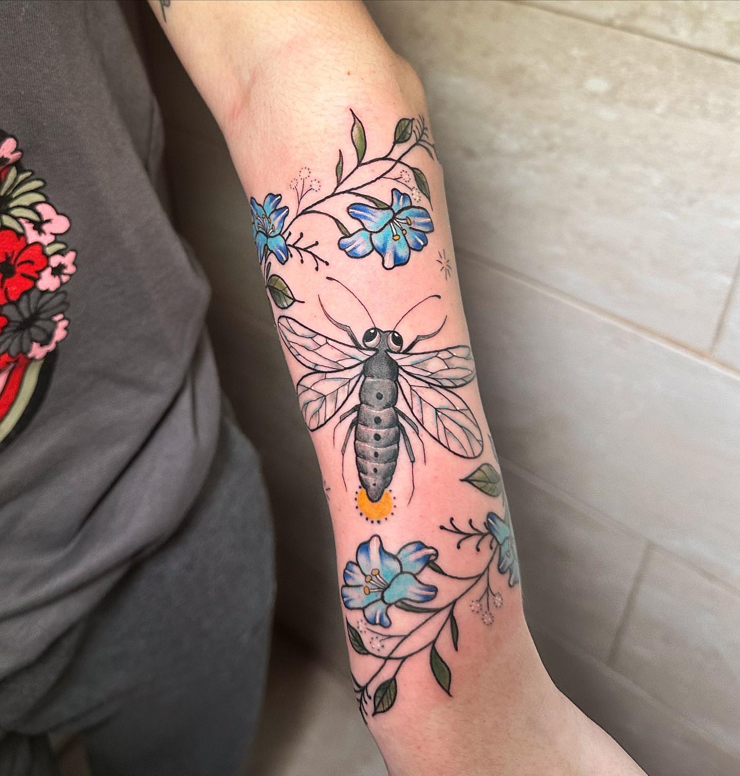 Moth and flowers dotwork tattoo on the forearm by Diana Kunz