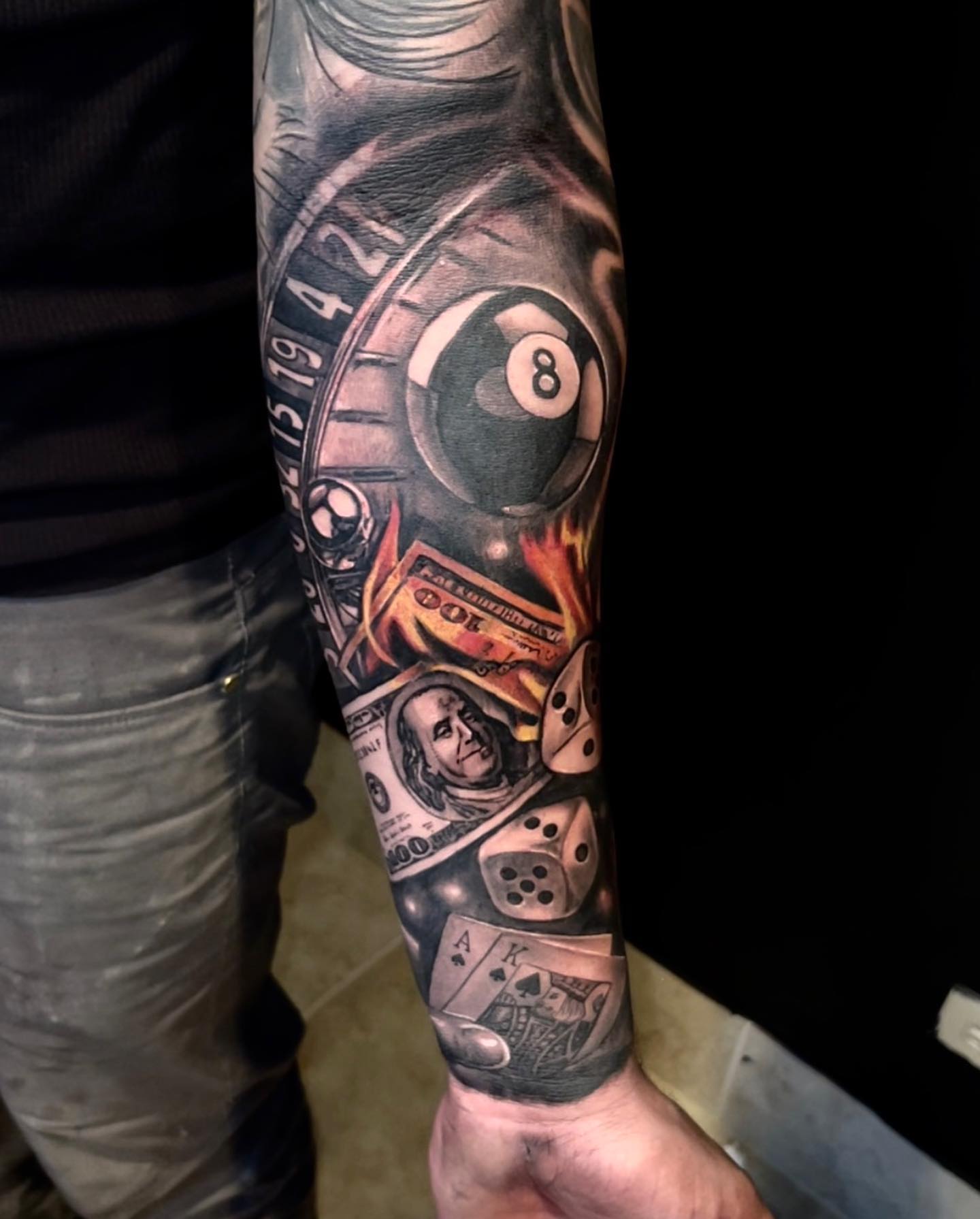 Billiards and gambling realism tattoo on the forearm by Luis Meneses