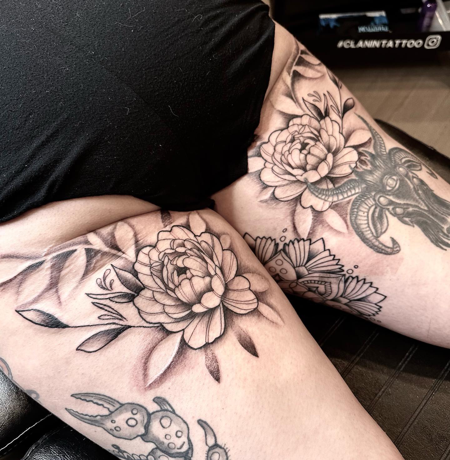 Peony flowers black and grey tattoo on the forearm by Matthew Clanin