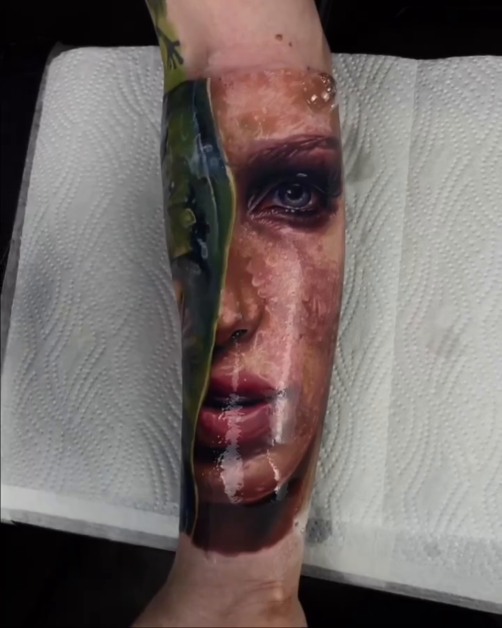 Woman's face and abstract green shape realism tattoo by Dmitriy Paramonov πΊπ¦