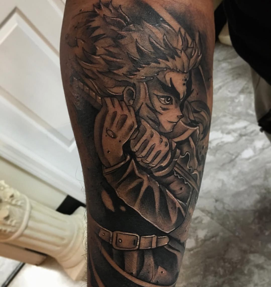 Anime character with sword anime tattoo on the forearm by Cody Wolfe