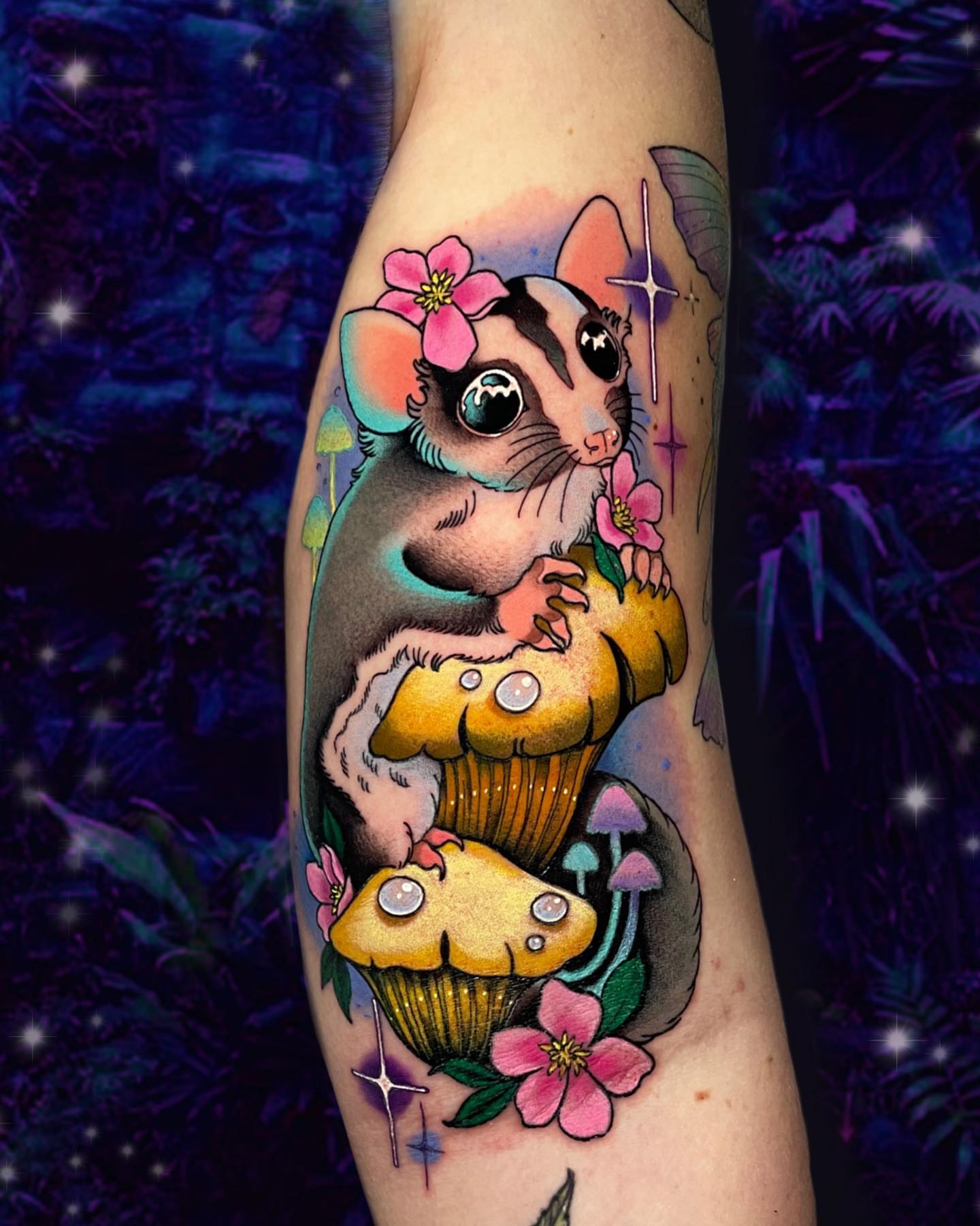 Sugar glider and cupcakes new school tattoo on the forearm by Wendy Ruiz
