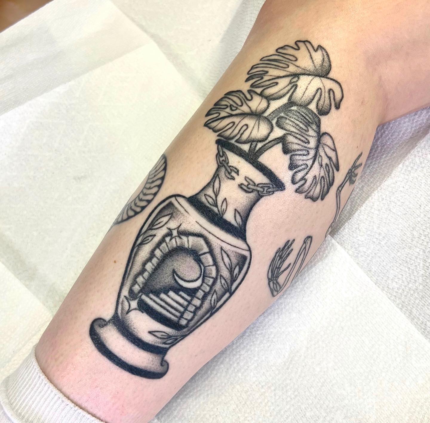 Vase with leaves American traditional tattoo on the forearm by 🤎Dannon 🕸