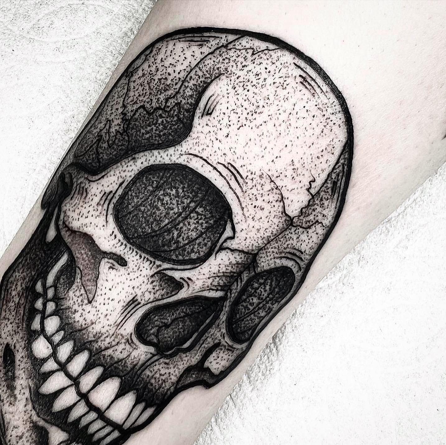 Skull dotwork tattoo on the forearm by Jared🗡Hughes