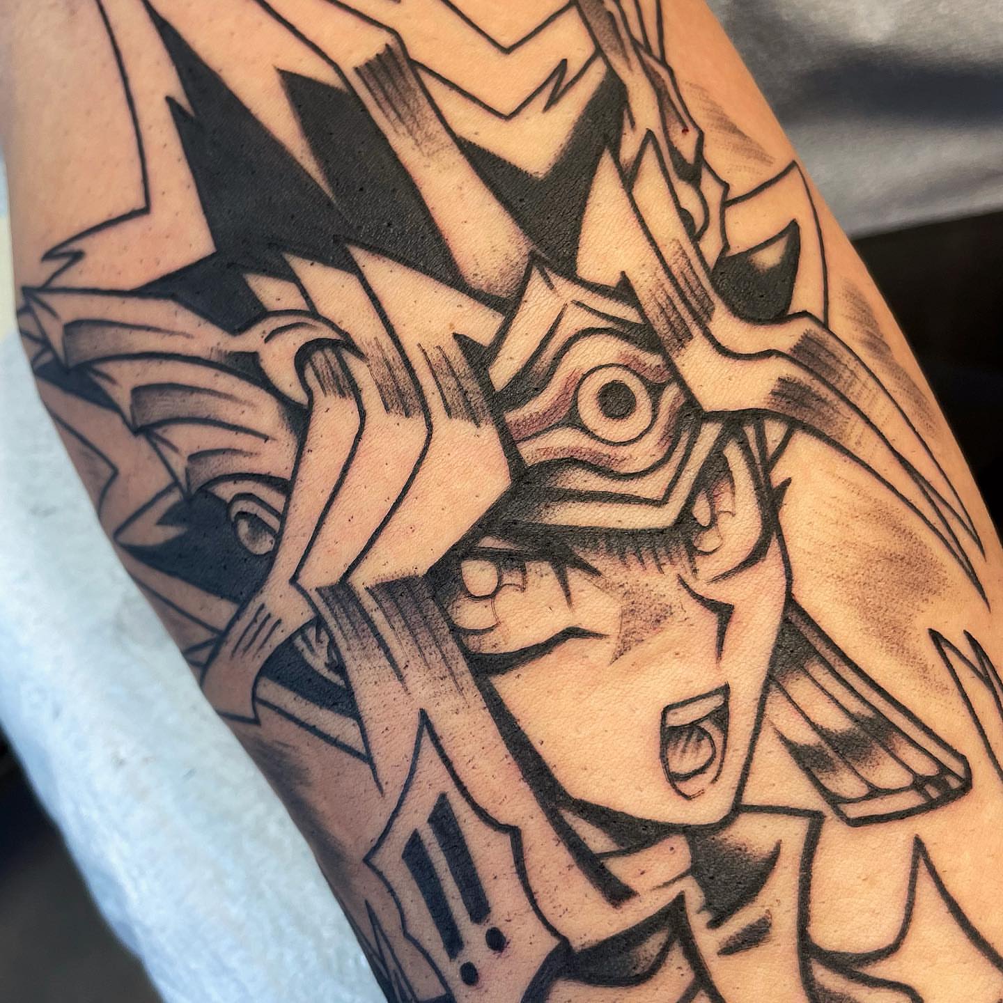 Anime character anime tattoo on the forearm by Bold Anime Tattoos