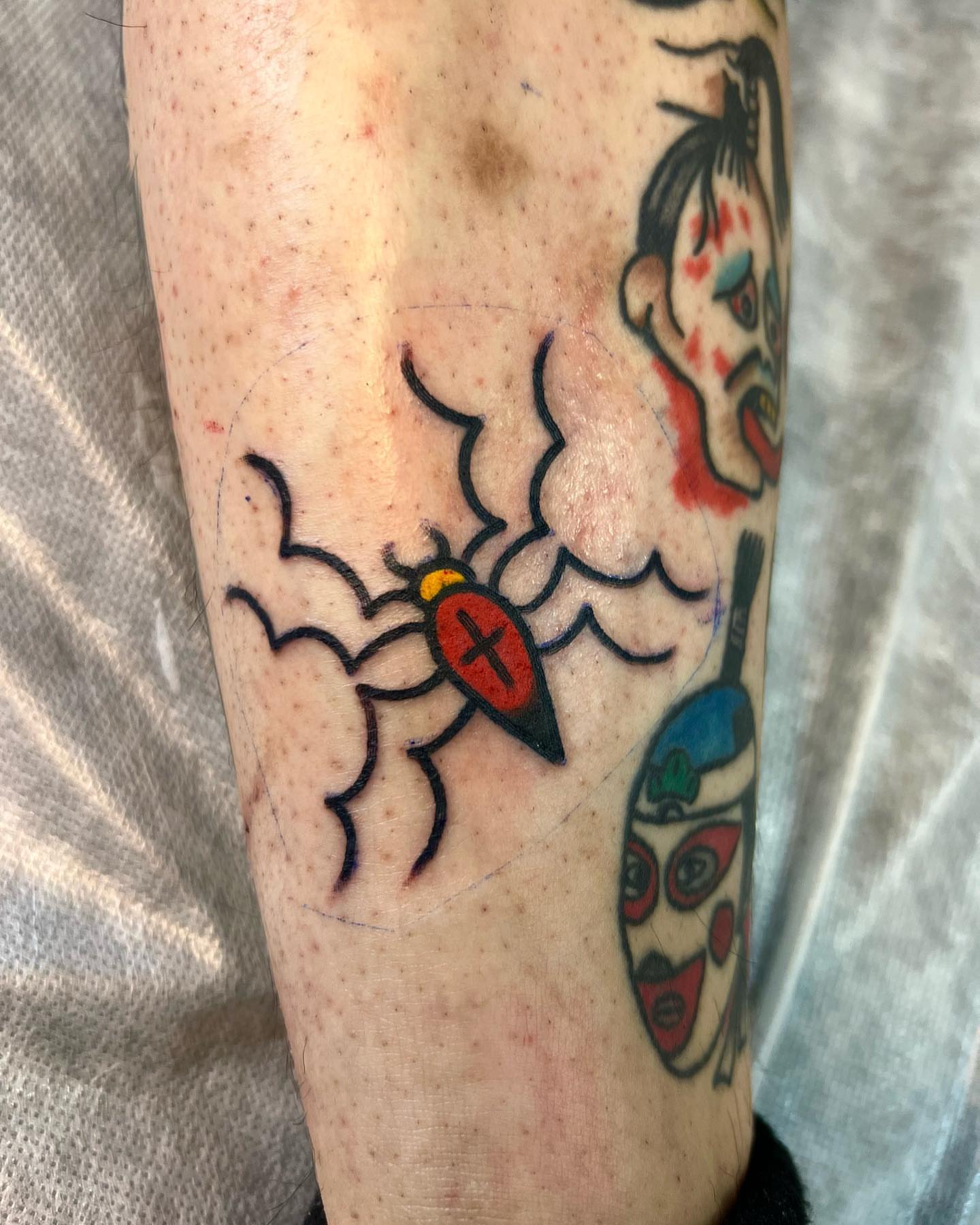Bug American traditional tattoo on the forearm by Nicholas Mella, Nashville, Tennessee