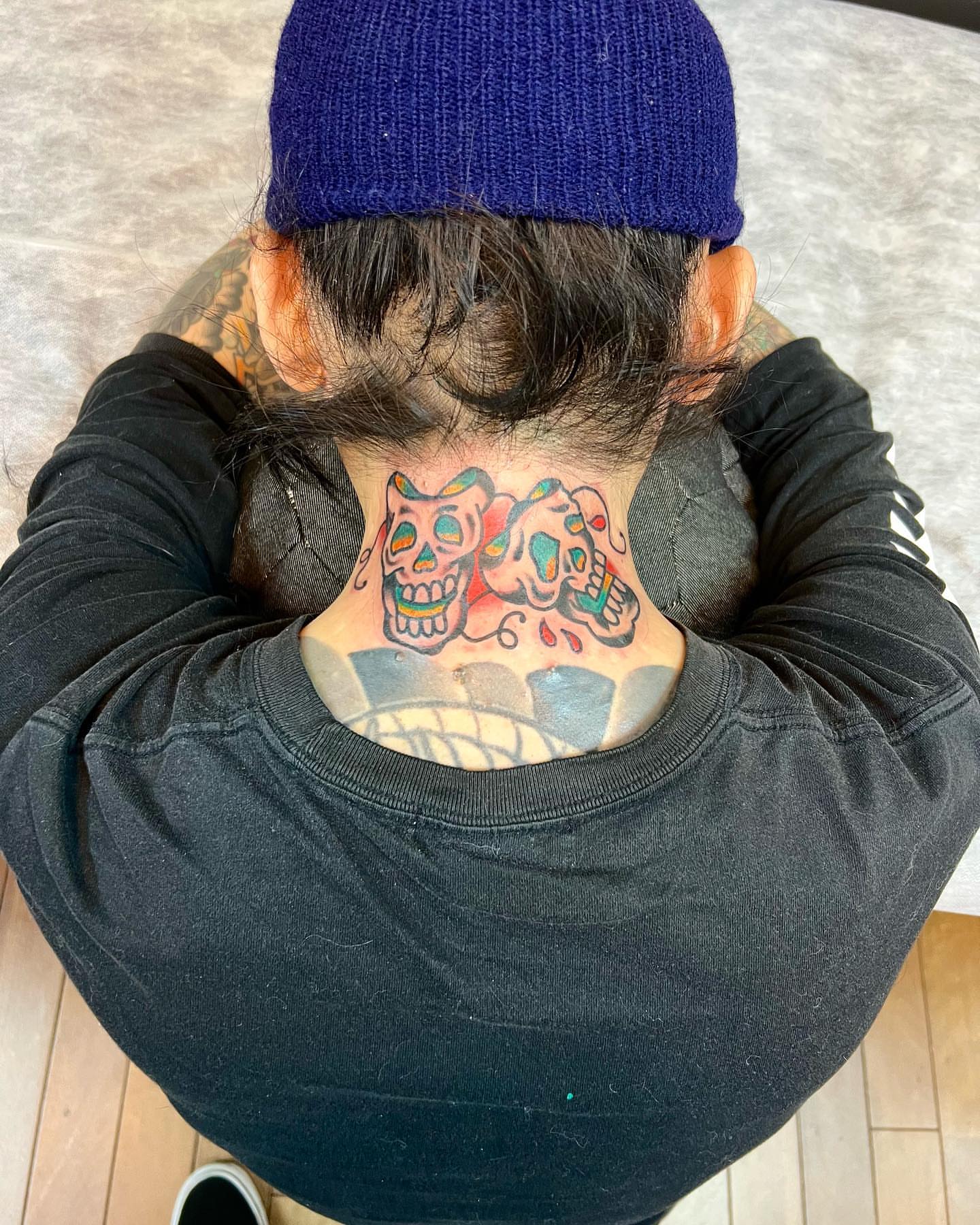 Skulls Chicano tattoo on the back by Nicholas Mella, Nashville, Tennessee