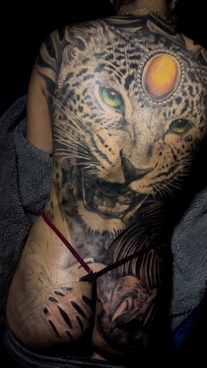 Leopard face realism tattoo by Kelsea Lake Schack