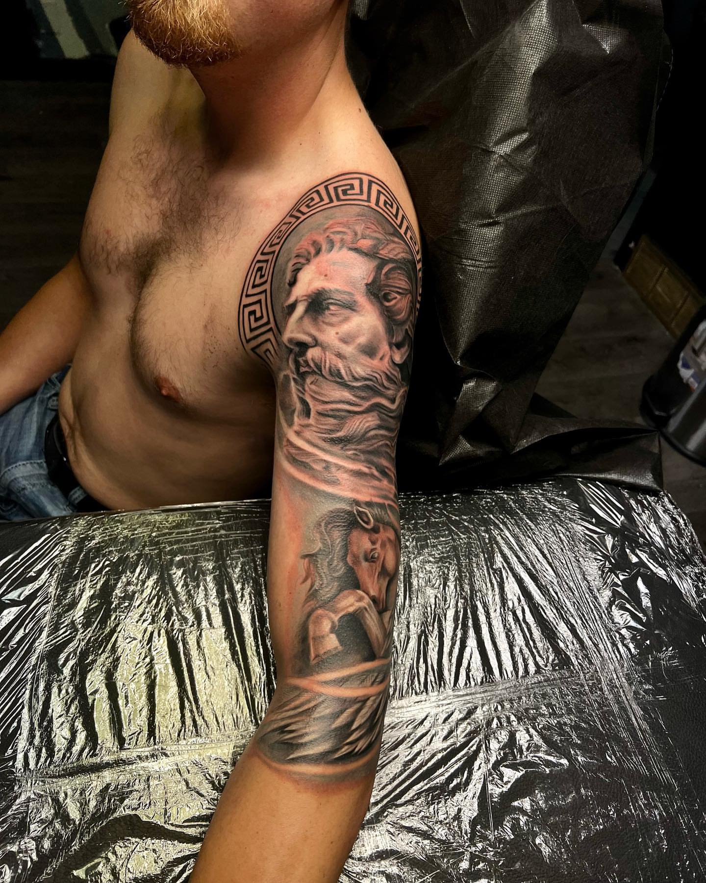 Ancient god realism tattoo on the forearm by Levi Tattoo Artist, Utah