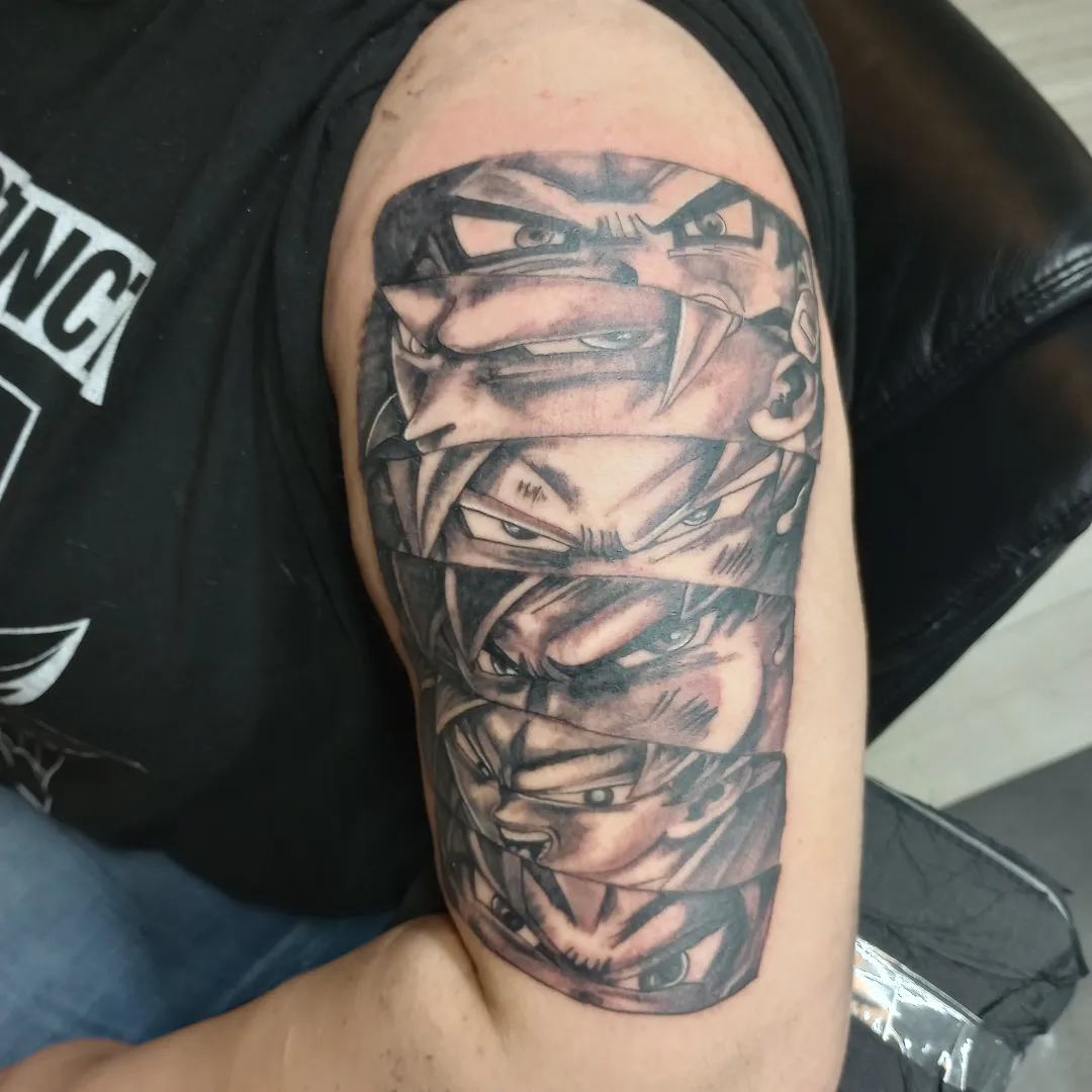 Angry warrior anime tattoo on the forearm by Daniel Illachek