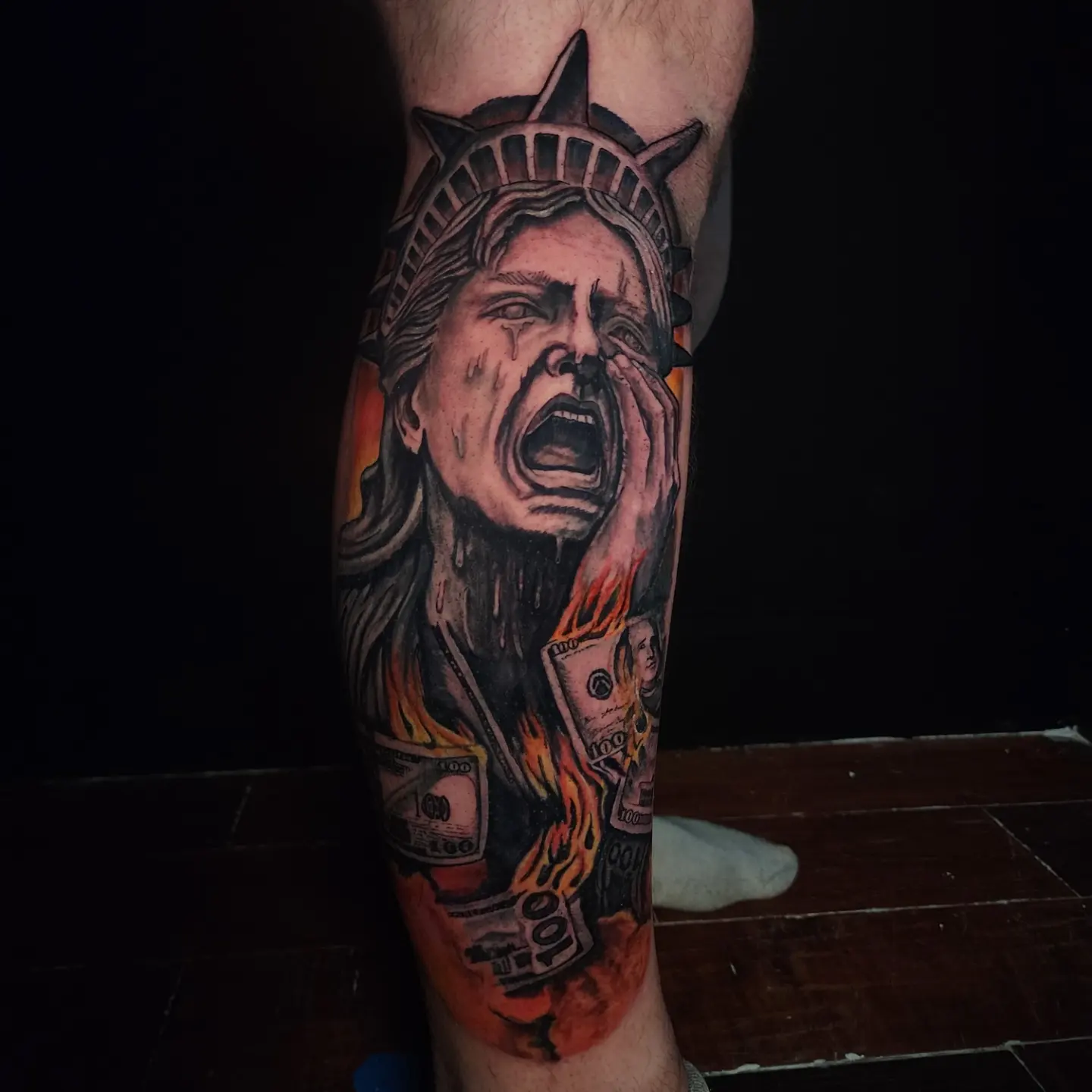 Statue of liberty realism tattoo on the forearm by Tyler Cromwell