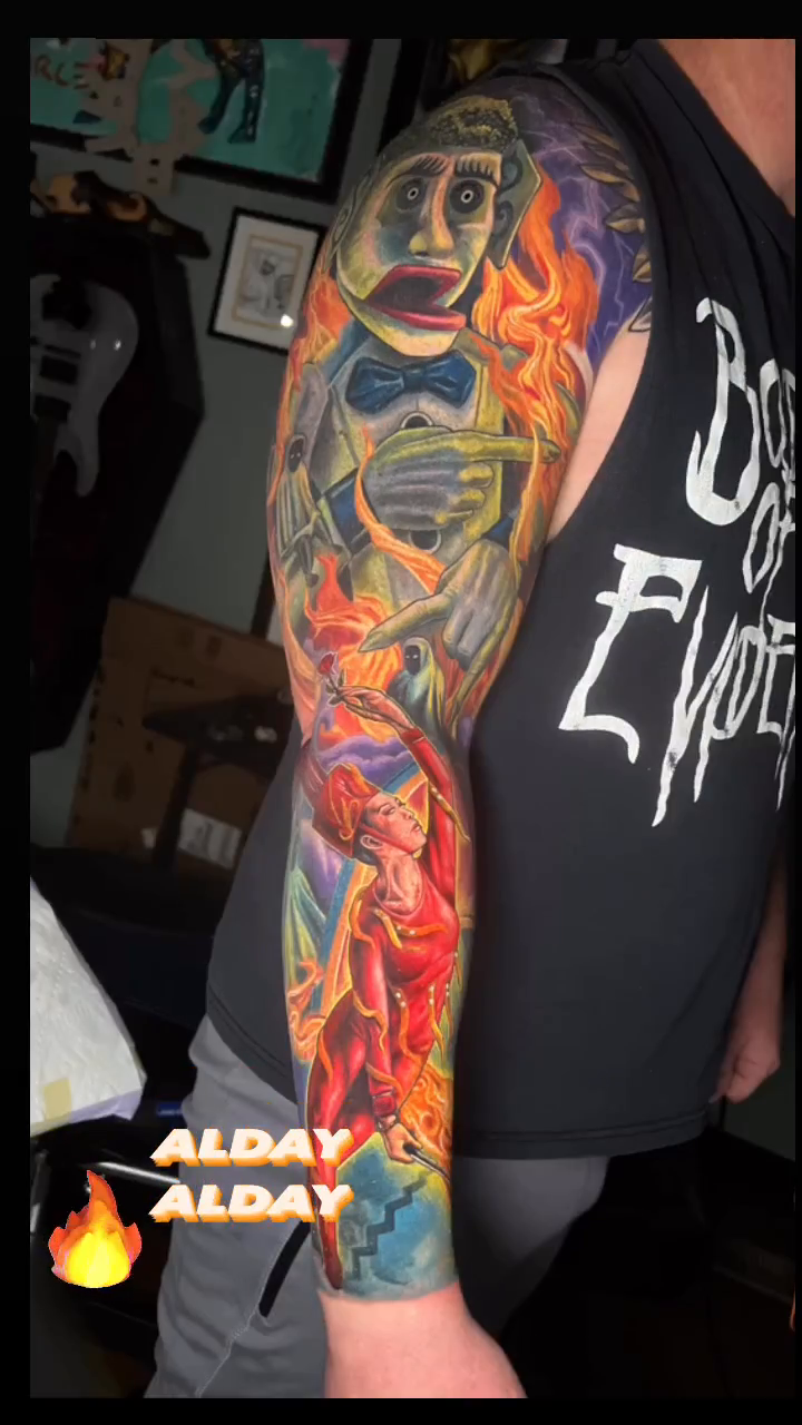 Puppet and figures in flames new school tattoo by Albuquerque Tattoo Artist, Albuquerque, New Mexico