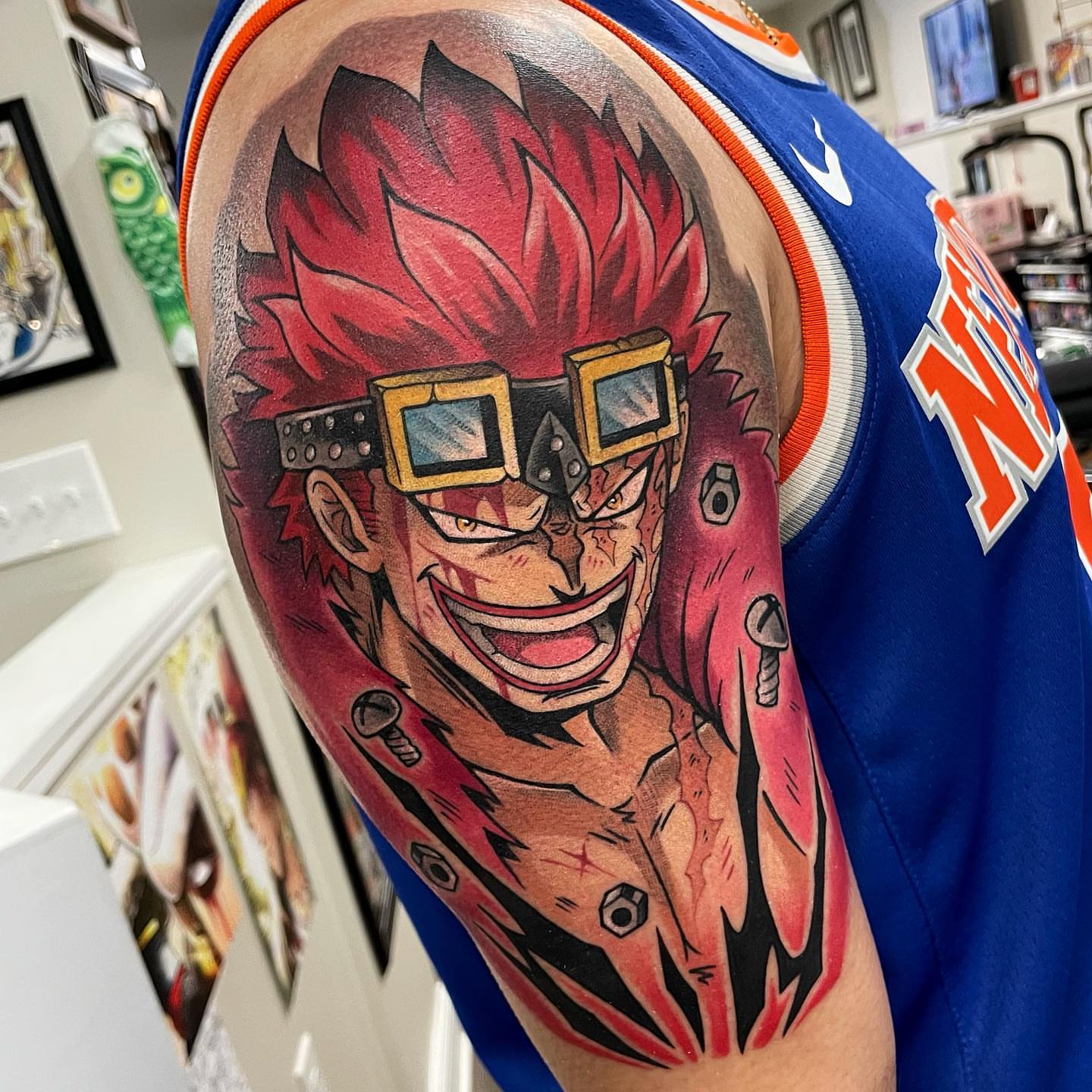 Anime character anime tattoo on the upper arm by Bold Anime Tattoos