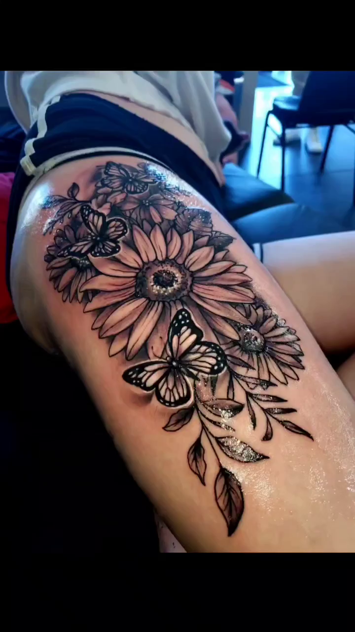Sunflowers and butterflies fine line tattoo by Drew Siciliano, Glendale, Arizona