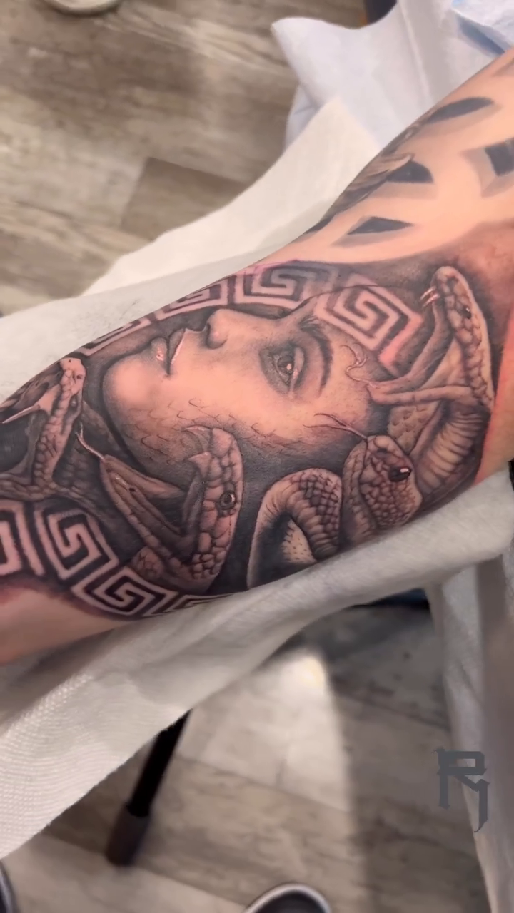 Tattoo by @rtist_ink — realism, black_and_grey