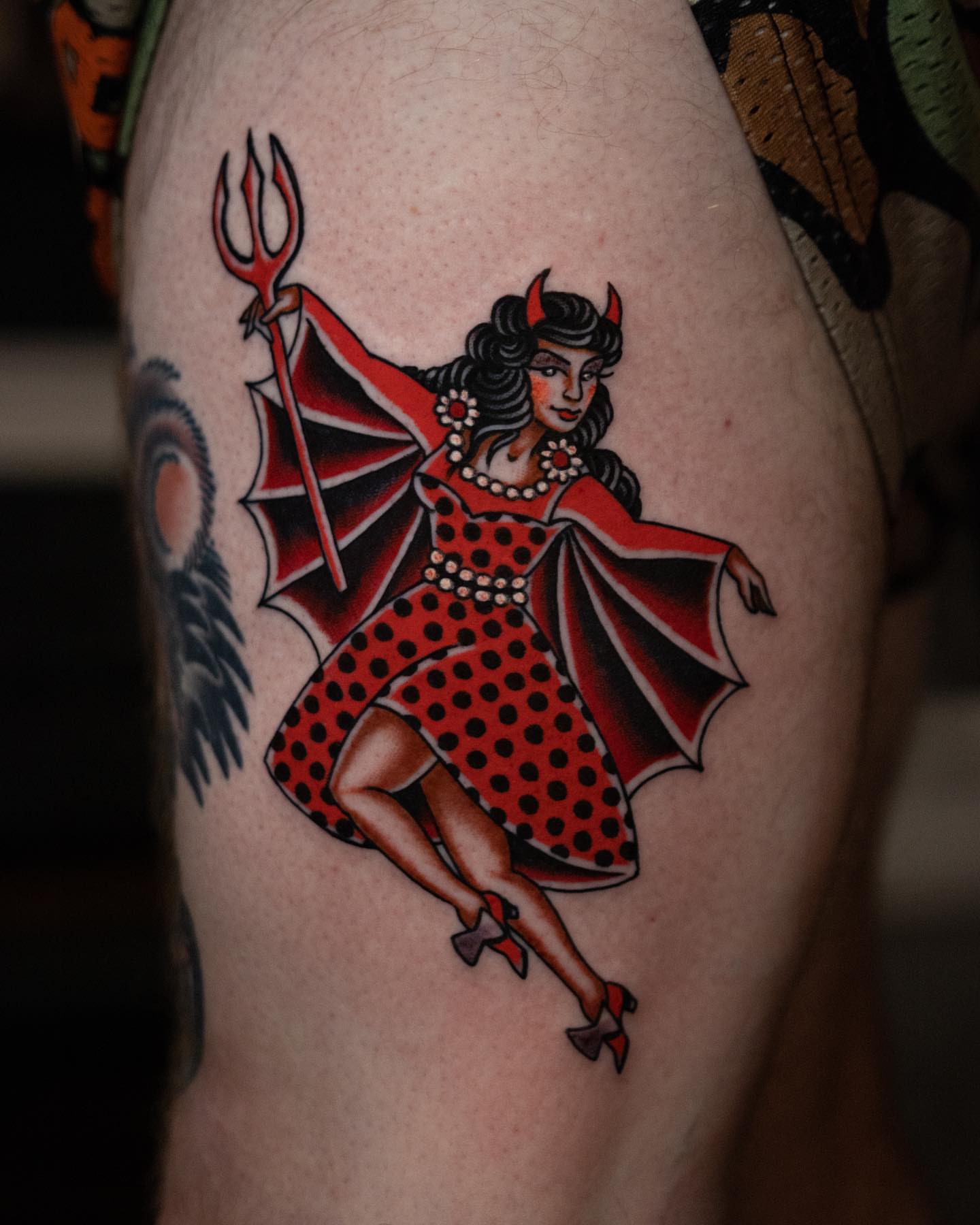 Devil pin-up girl American traditional tattoo on the thigh by Danny Derrick, San Luis Obispo, California