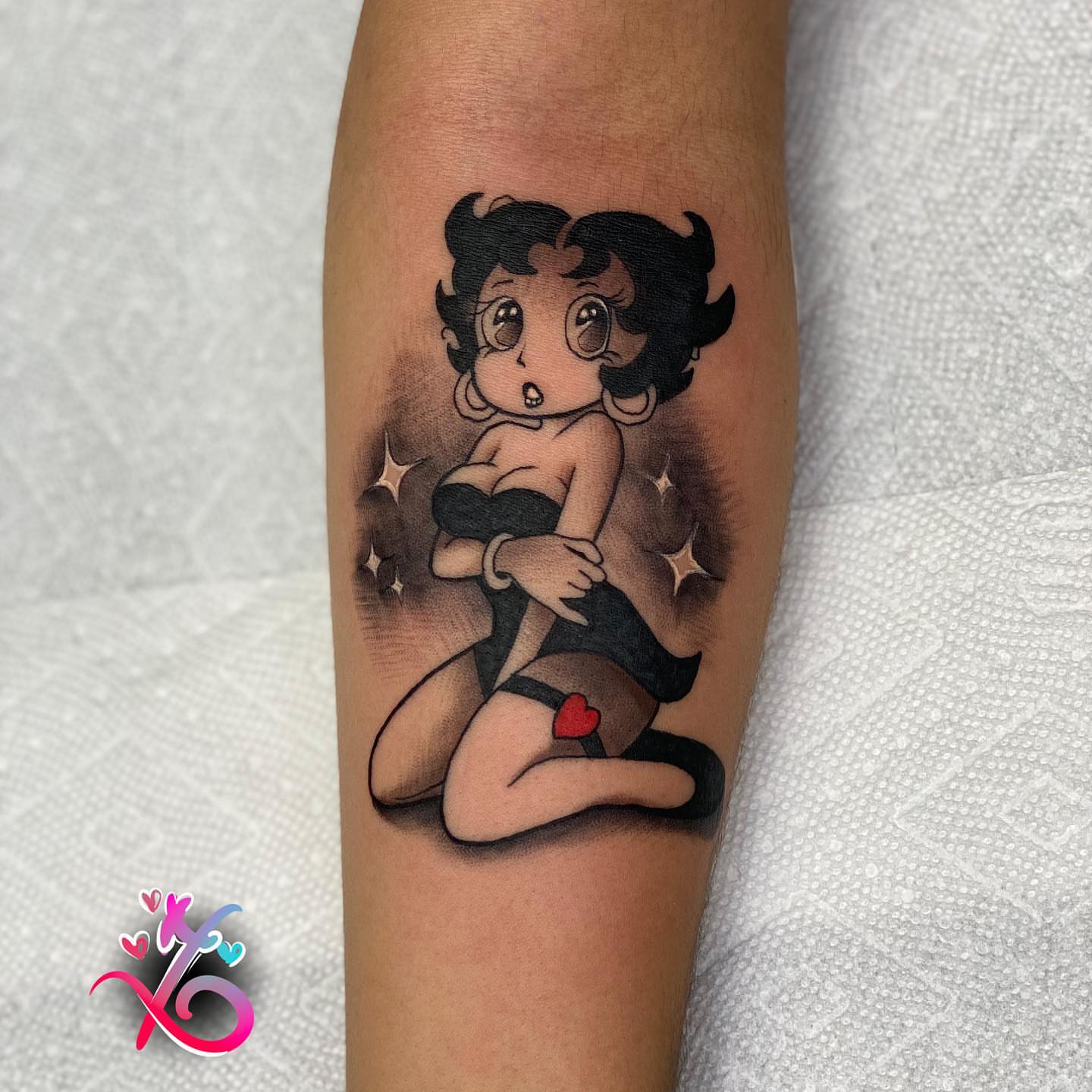 Betty Boop black and grey tattoo on the forearm by Keyon J