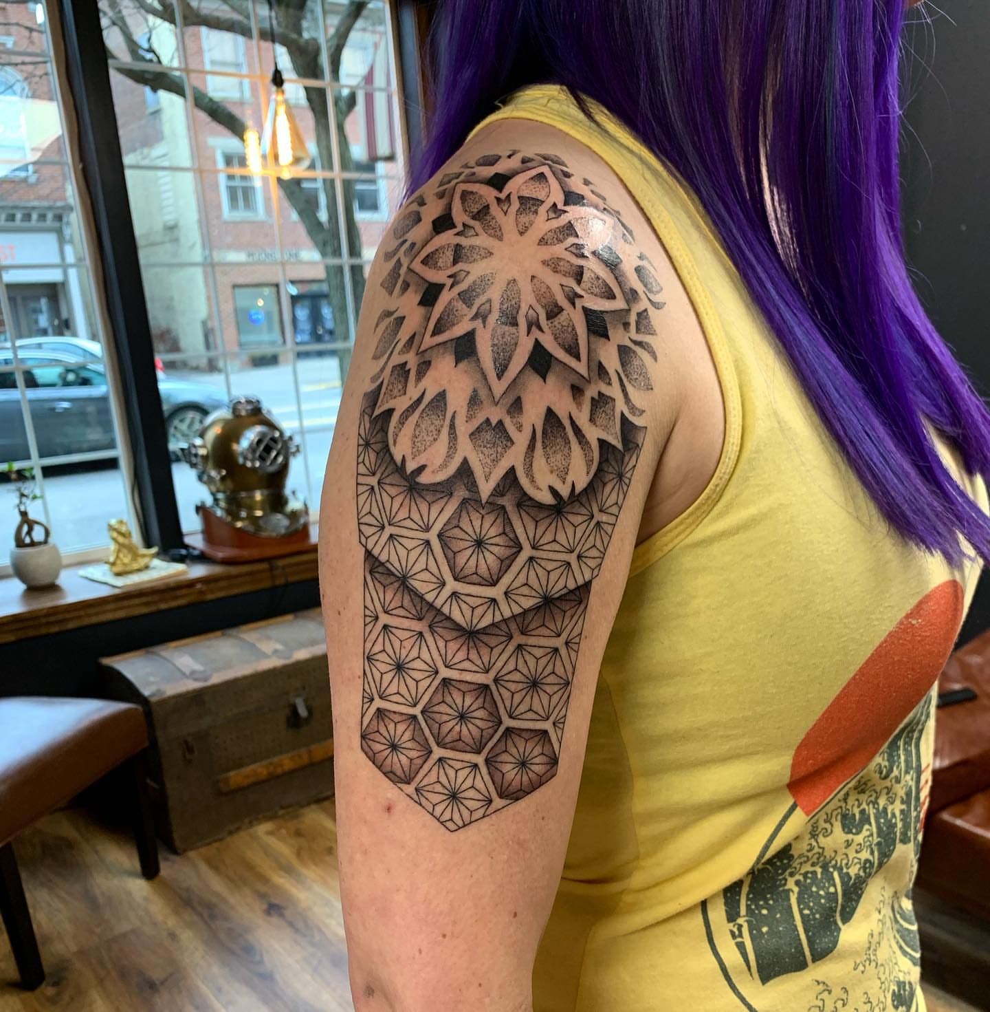 Geometric mandala geometric tattoo on the upper arm by Jacob Deirfield, Circleville, Ohio