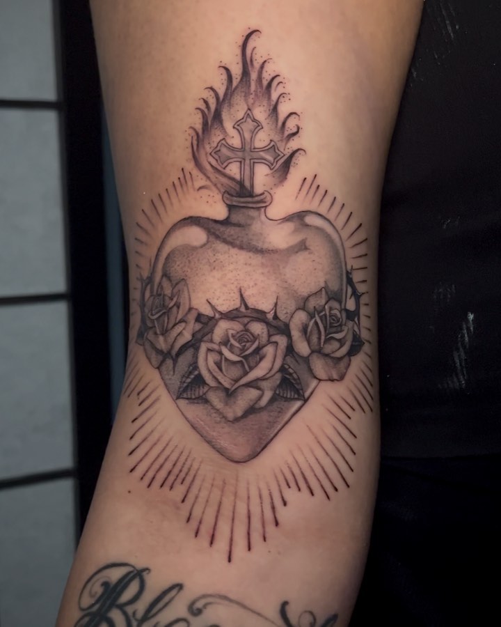 Heart with cross and roses black and grey tattoo on the forearm by jordyn ๐ญ