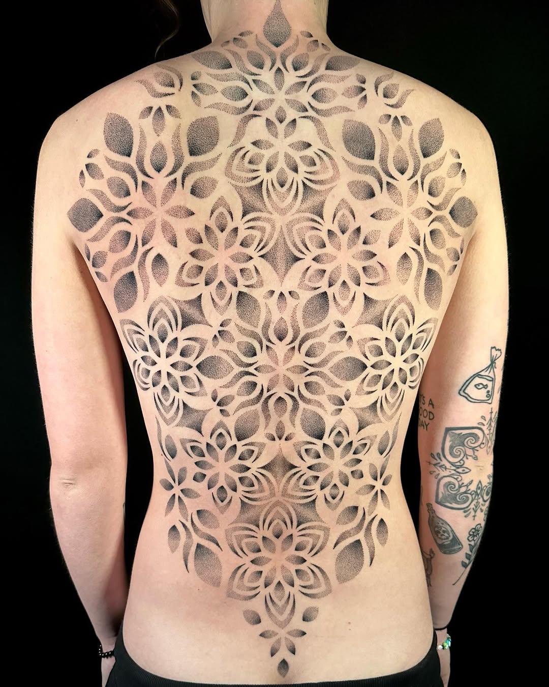 Geometric mandala pattern geometric tattoo on the back by Chelsey