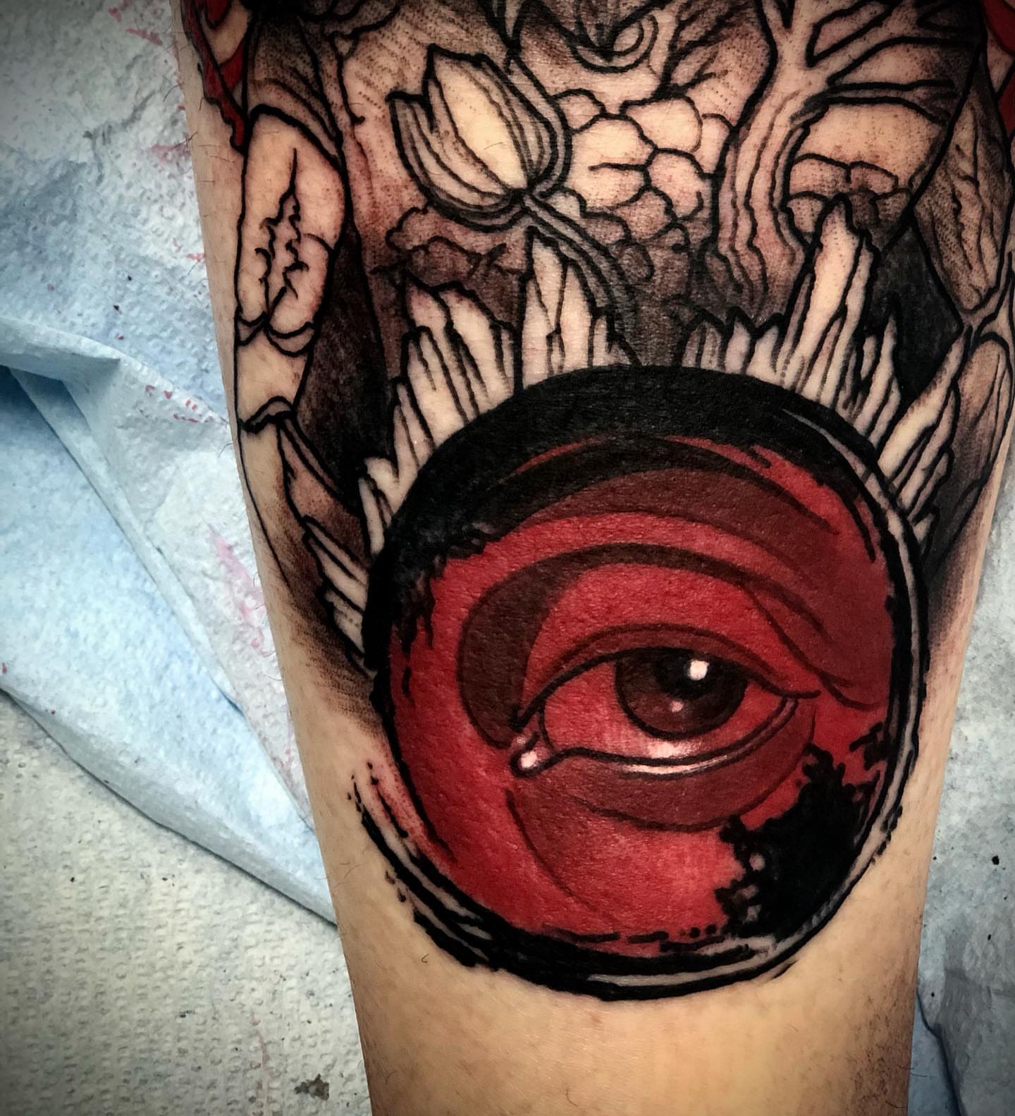 Eye realism tattoo on the forearm by Alec Bauer