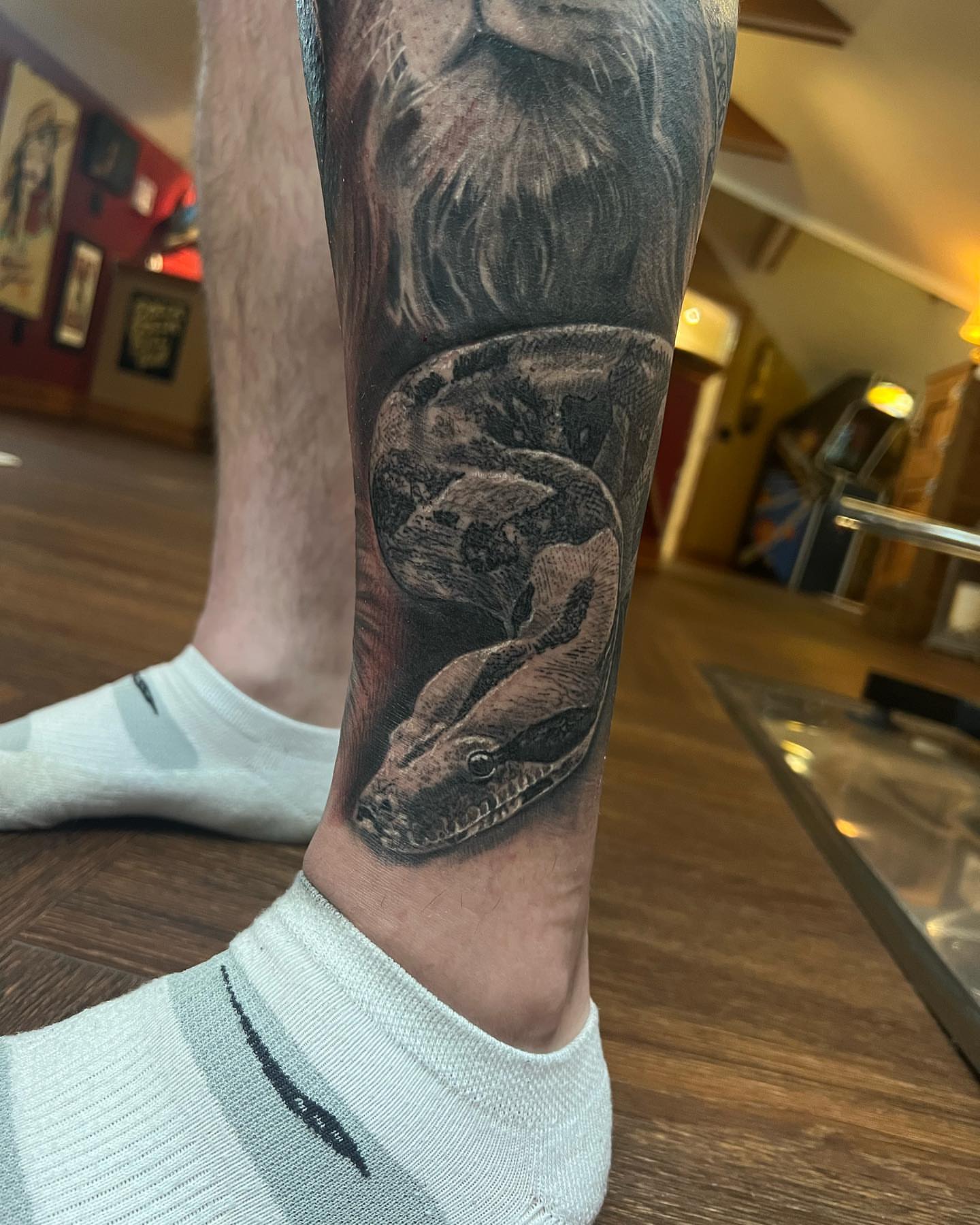 Tattoo by @brycemoodietattoo — realism, black_and_grey
