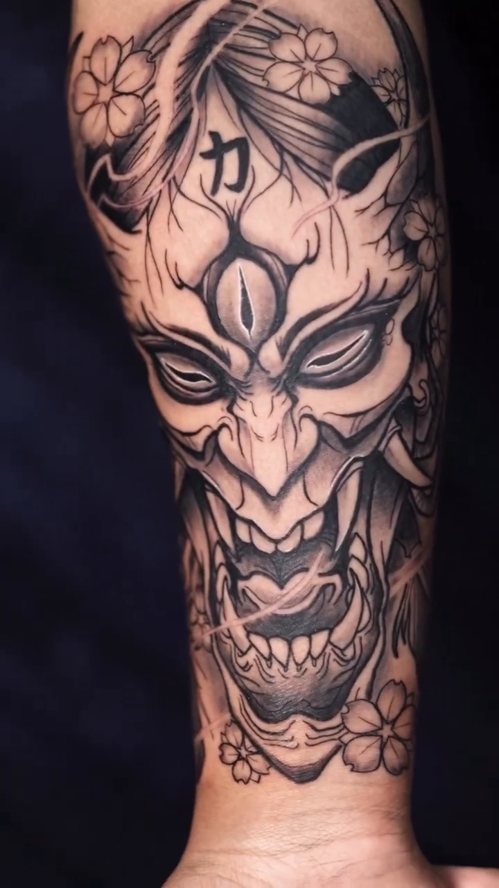 Oni mask with flowers japanese irezumi tattoo by Binn Binn - Houston Tattoo Artist