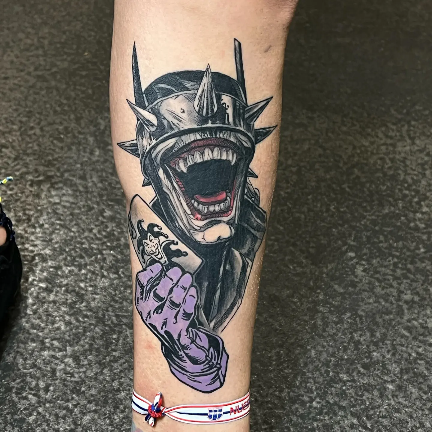 Joker dark realism tattoo on the forearm by Levi Cox, Powell, Ohio