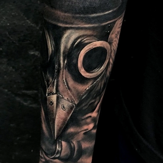 Plague doctor mask realism tattoo on the forearm by Артем Летний